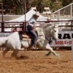 Barrel Racing bustin at PRCA Payson Spring Rodeo 2013 in Payson, AZ