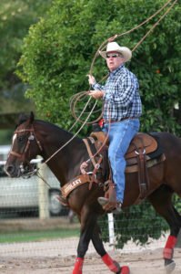 Pro Rodeo Team Roping, Victor Aros,left, and his team roping partner Hal Earnhardt