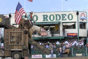 Extreme Mustang Makeover's Scott Smith going down the Stagecoach at the 2015 Reno Rodeo