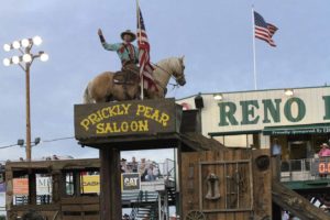 Extreme Mustang Makeover's Scott Smith on top of a Stagecoach at the 2015 Reno Rodeo