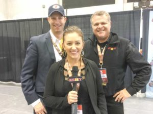 Kevin Contardo-Kayla Zadel-Chris Greenwood with RFD-TV in the WNFR 2015 Press Room