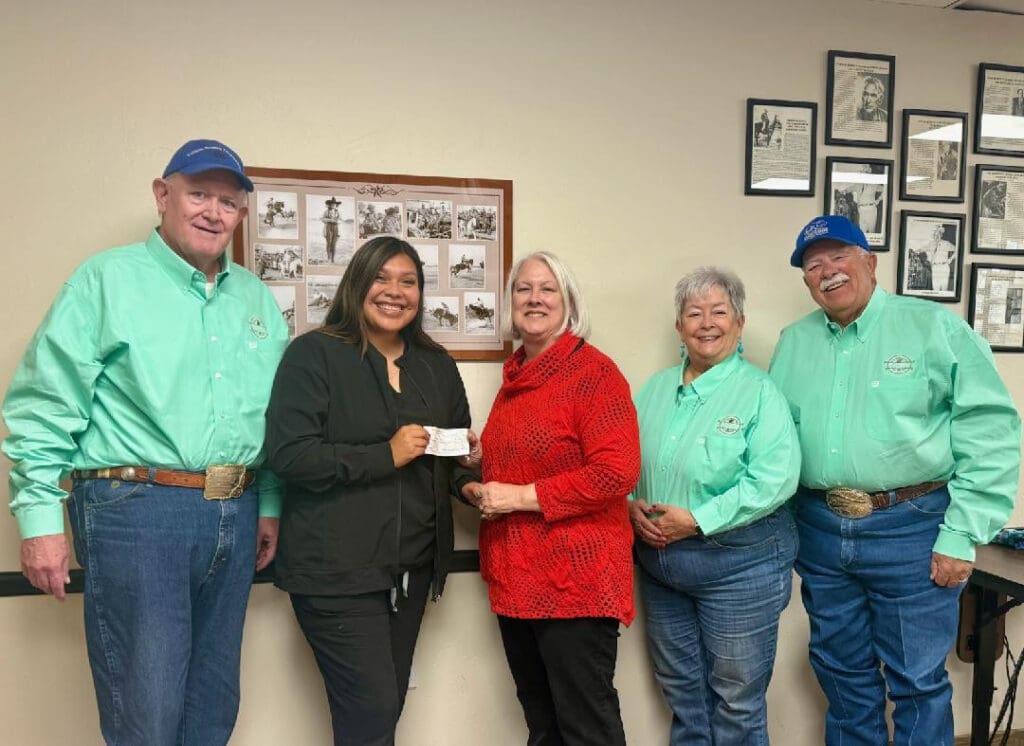 Pictured: Butch Krietemeyer, Evelyn Young, Susan Dabbs, Deb Barnett, & Walt Johnson - Evelyn Young receiving her award. Credit: Tucson Rodeo Foundation