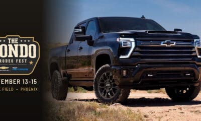 Black 2026 Chevy Silverado HD on a desert trail beside The Hondo Rodeo Fest logo, presented by Chevrolet and Valley Chevy Dealers, November 13-15 at Chase Field in Phoenix