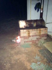 After caring for all the horses, we showered in the facilities at the track. The water was heated the old-fashioned way - with a large, wood-burning fire in a big, barrel stove.