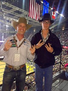Brian Doty and Jake House Throwing up the W's for Western Wishes at the 2016 Wrangler NFR