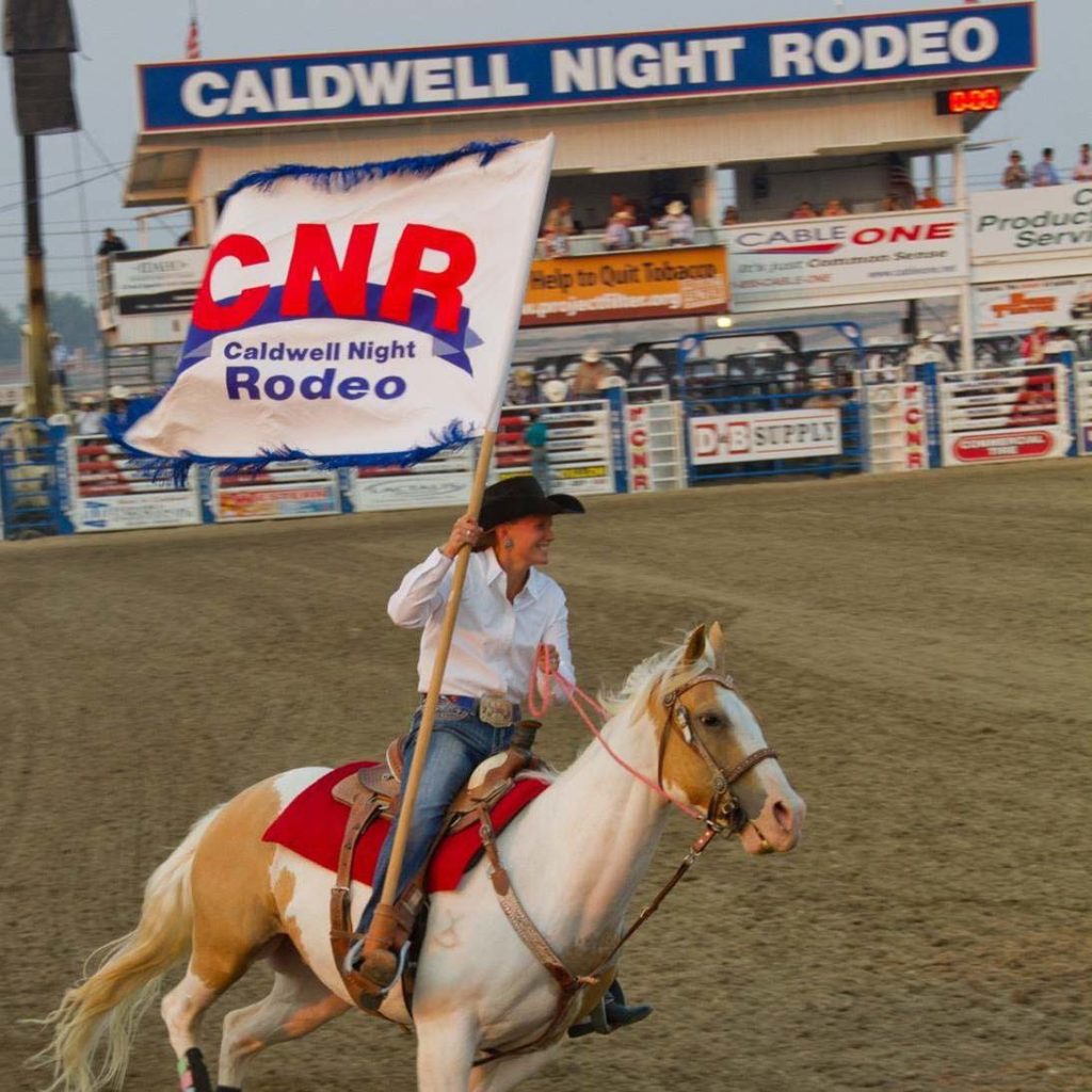 Caldwell Night Rodeo Flag Cowgirl