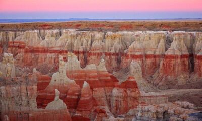 Pink light of twilight in the sky at coal mine canyon in Tuba City, Arizona