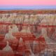 Pink light of twilight in the sky at coal mine canyon in Tuba City, Arizona