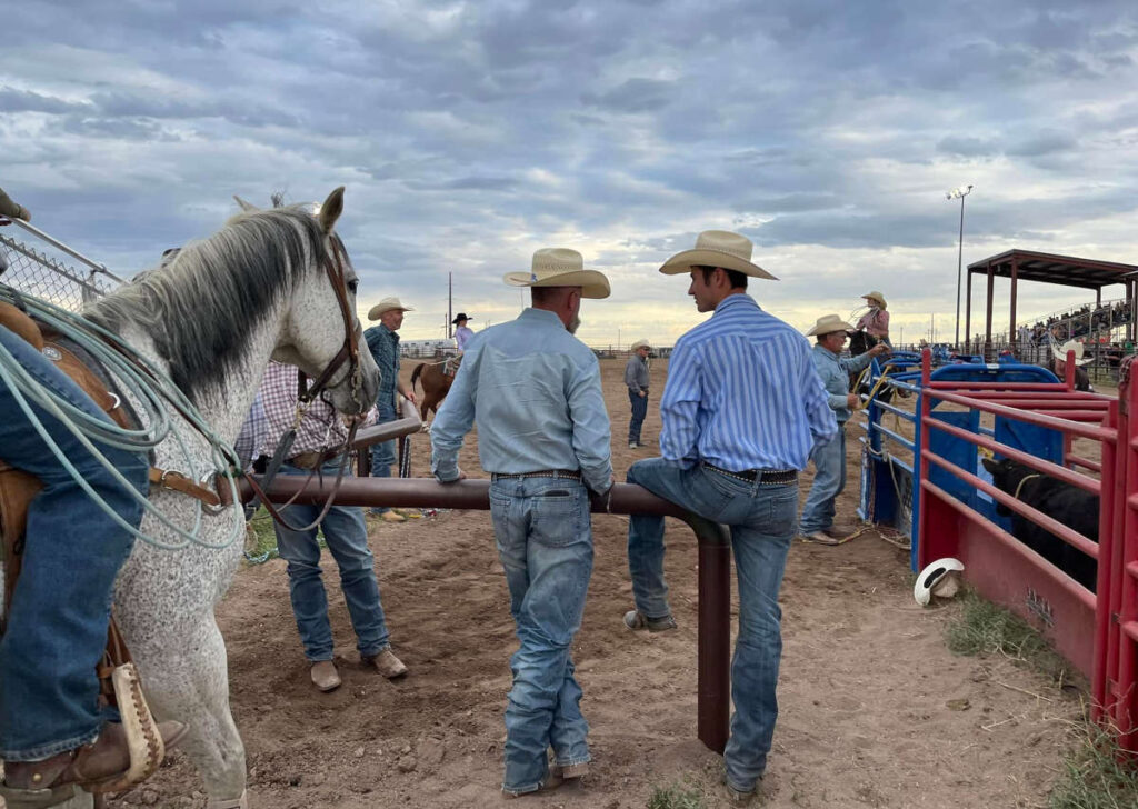 Ropers by the roping box and chute
