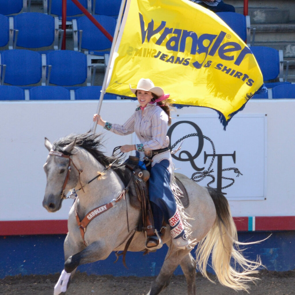 Flag girl running a Wrangler flag