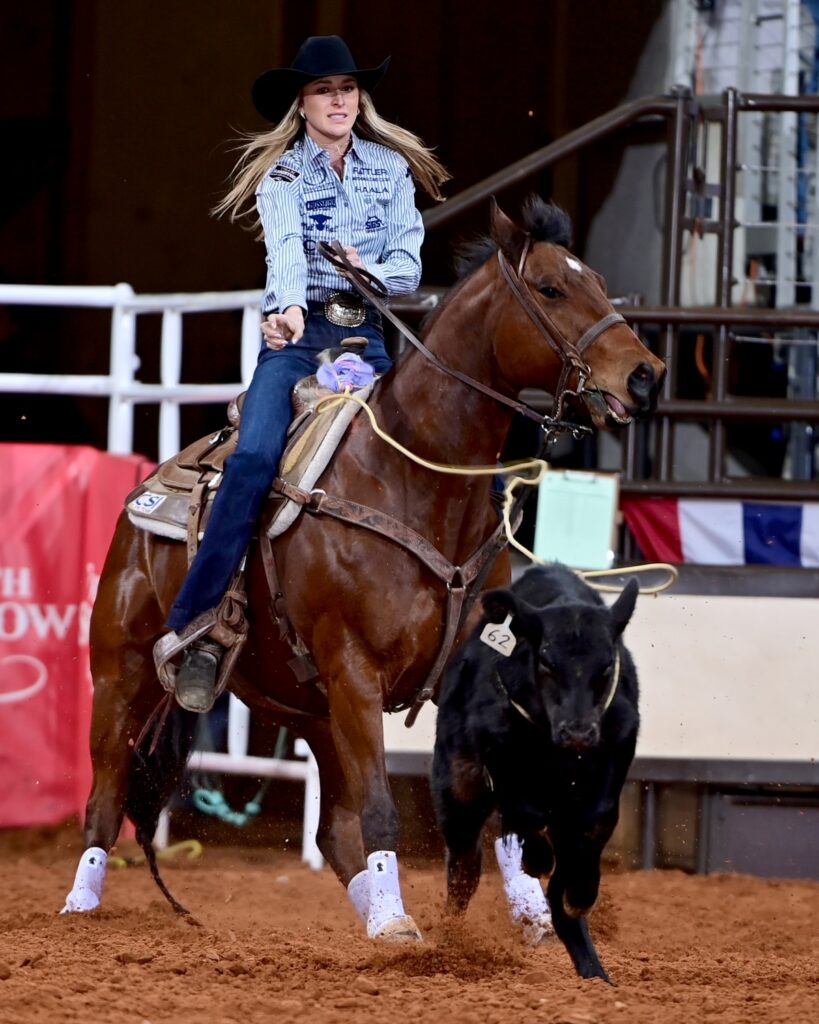 Kinlie Brennise of Craig, Colorado, was the only breakaway roper with a clean run of under three seconds in round one of Bracket 1 at the Fort Worth Stock Show & Rodeo’s ProRodeo Tournament. She took first place with a time of 2.5 seconds. FWSSR photo by James Phifer
