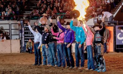 Champions of the 2025 National Western Stock Show Rodeo salute the crowd on January 26 in Denver Coliseum. NWSS photo by Ric Andersen