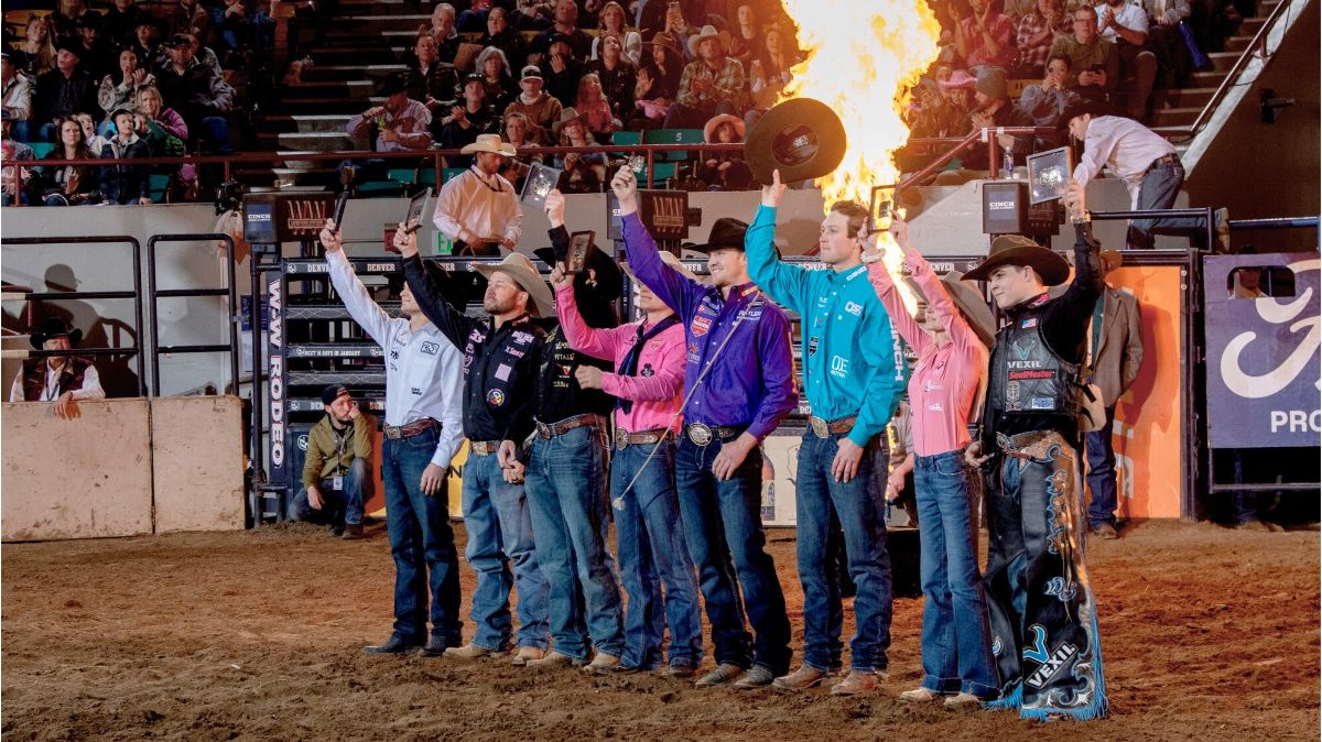 Champions of the 2025 National Western Stock Show Rodeo salute the crowd on January 26 in Denver Coliseum. NWSS photo by Ric Andersen