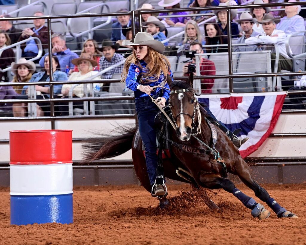 Emily Beisel of Weatherford, Oklahoma, fell just three one-hundredths of a second short of matching the Dickies Arena record at the Fort Worth Stock Show & Rodeo’s ProRodeo Tournament. She rode Ivory On Fire (Liza) to win round one of Bracket 4 with a time of 16.11 seconds. FWSSR photo by James Phifer