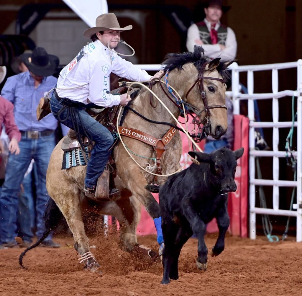 Tie-down roper Ty Harris from San Angelo, Texas, won round two of Bracket 6 at the Fort Worth Stock Show & Rodeo ProRodeo Tournament. His success here came aboard Daddys Shiner Cat, a 14-year-old gelding owned by Canadian Logan Bird. FWSSR photo by James Phifer.