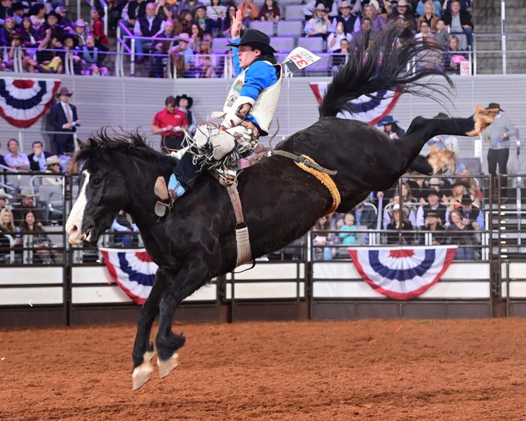 The Fort Worth Stock Show & Rodeo Pro Rodeo Tournament is looking good for bareback rider Jayco Roper of Oktaha, Oklahoma. Roper finished at the top of round one of Bracket 4 with a 90.5-point effort aboard The Crow from Championship Pro Rodeo. FWSSR photo by James Phifer.