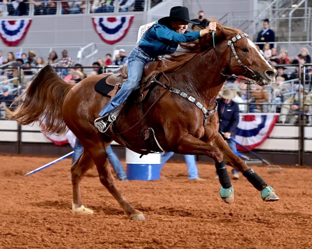 Jymmy Kay Cox of Pleasanton, Texas, and her sorrel horse Chase won the opening round of Bracket 2 at Fort Worth’s ProRodeo Tournament with the fastest time of the week – 16.27 seconds. FWSSR photo by James Phifer