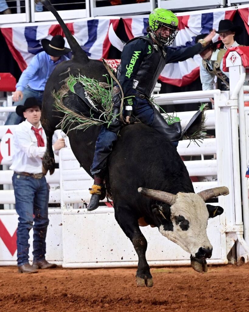 T Parker of Winnie, Texas, won Semi-finals B at the Fort Worth Stock Show & Rodeo’s ProRodeo Tournament with a 90-point ride on Sutton Pro Rodeo’s bull One Chance. Parker’s win advanced him to Saturday’s Championship Finals and added more than $4,000 to his winnings at Dickies Arena. FWSSR photo by James Phifer.