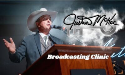 Justin McKee speaking at lectern at a broadcast clinic