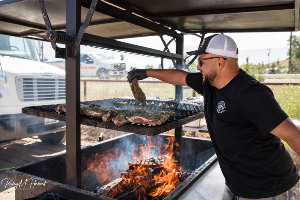 Man grilling ribs.