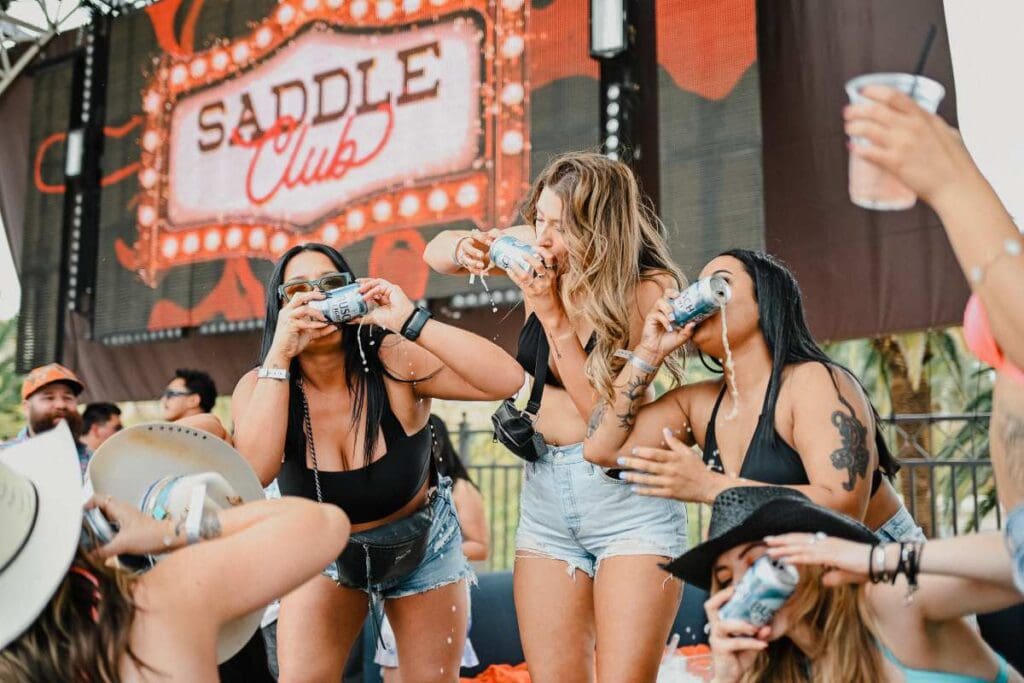 Group of girls chugging Busch Light