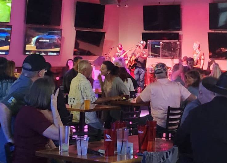Crowd listening to a band