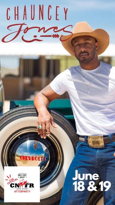 Singer and songwriter Chauncey Jones standing by a truck. The Gaslight Social photo