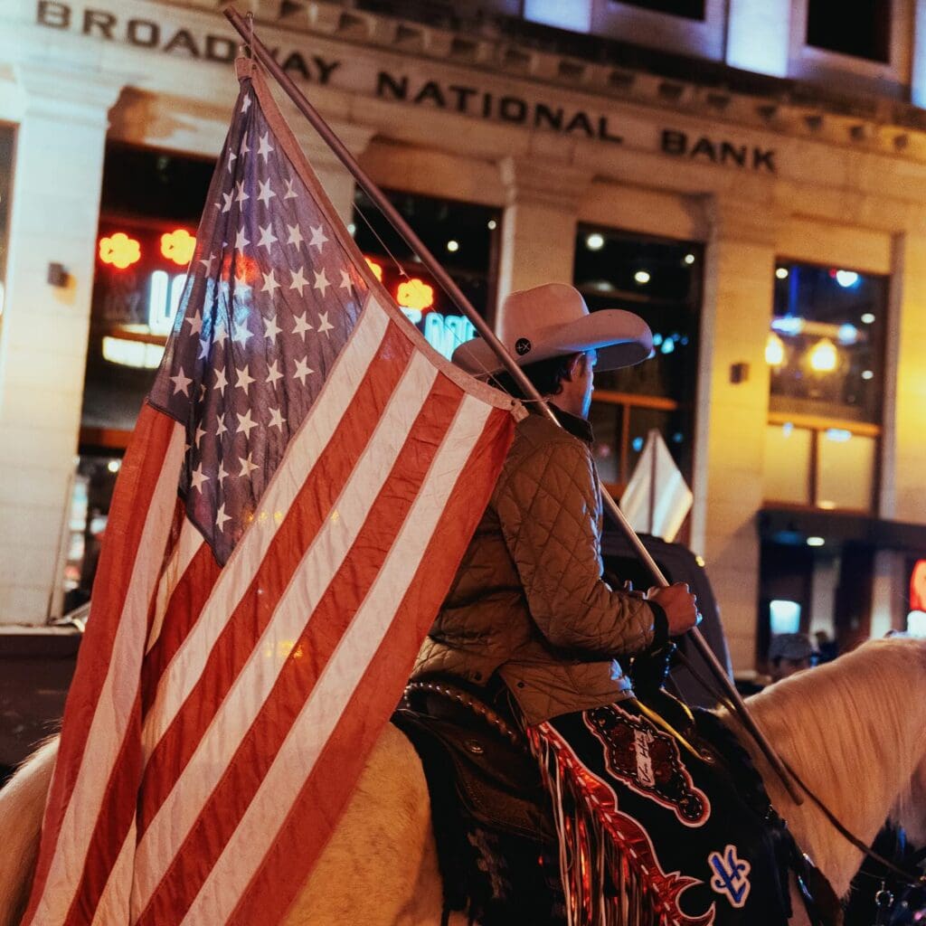 Cowboy carrying American Flag in Nashville