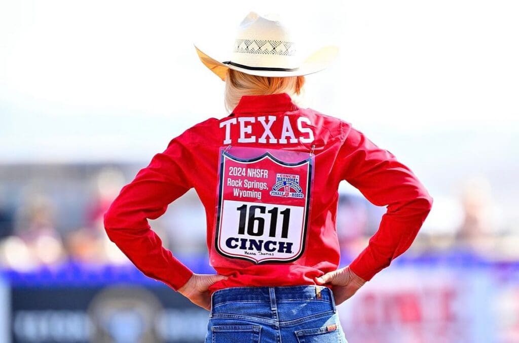 Texas High School Rodeo Athlete with back turned to camera