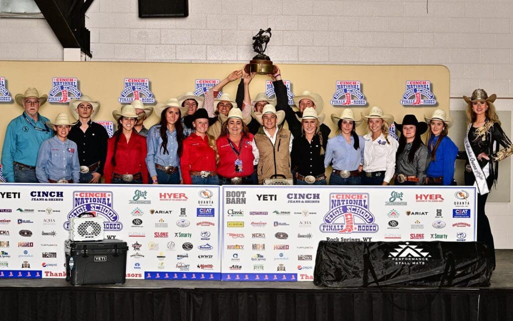 Texas High School Rodeo athletes smiling for group photo