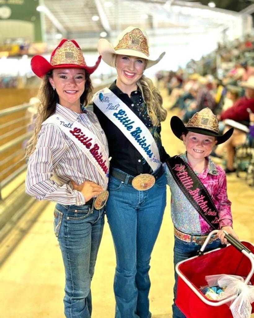 3 Young royalty with their hats and sachets @ National Little Britches Finals Rodeo