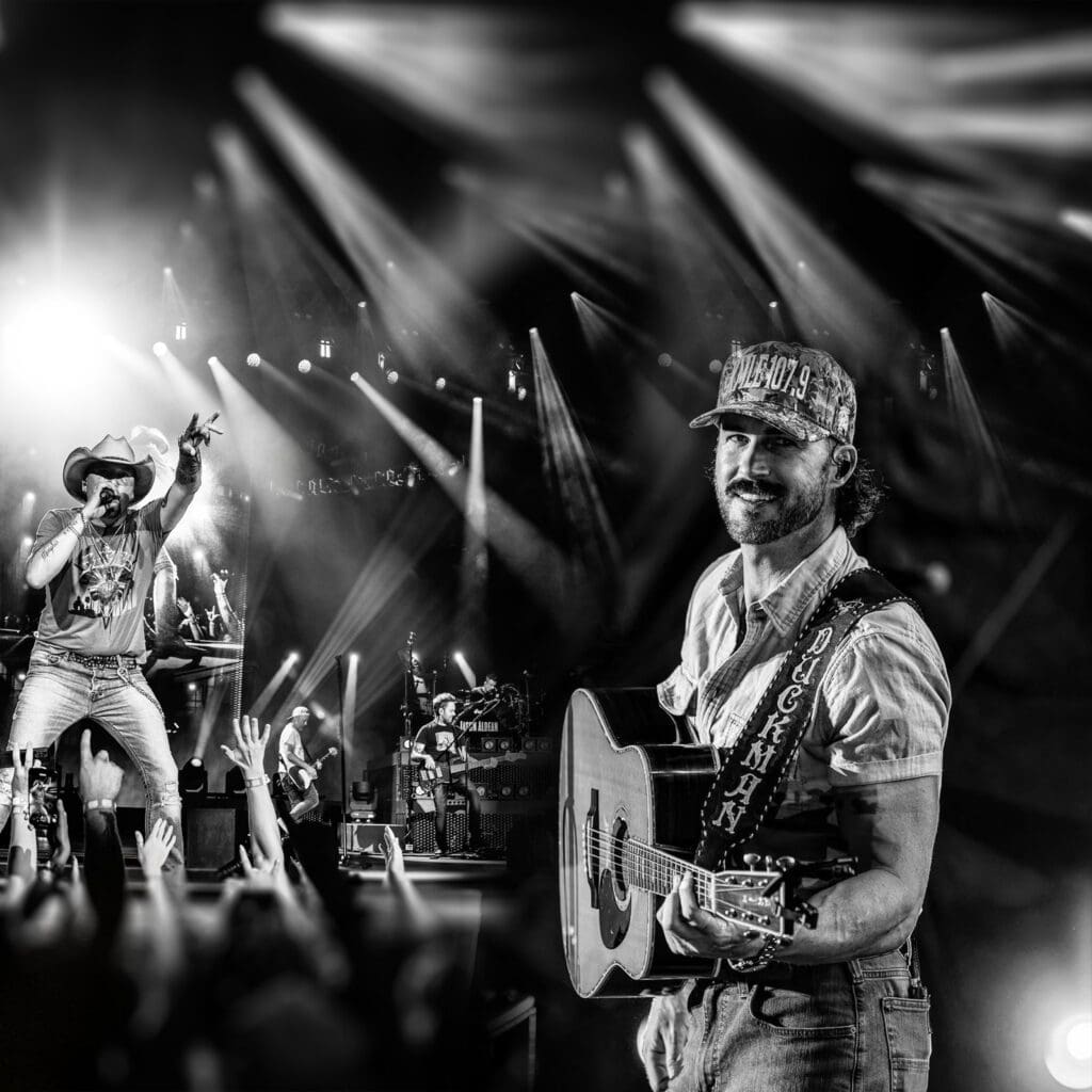 Jason Aldean and Riley Green performing