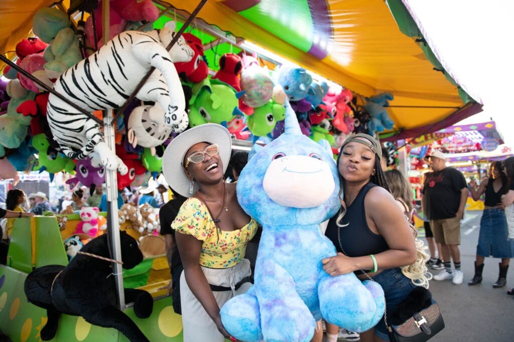 Friends enjoying the Midway Carnival