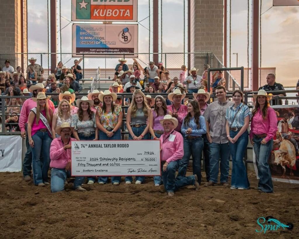 Taylor Rodeo Committee with scholarship check