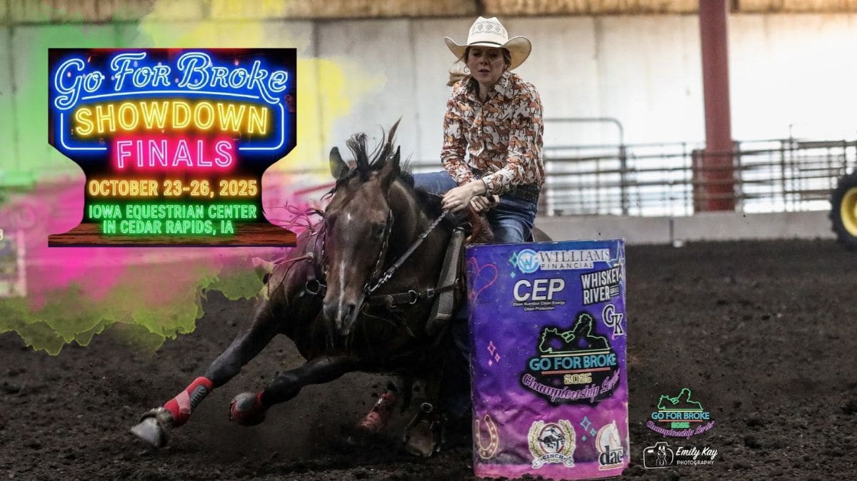 Cowgirl riding a horse around a barrel