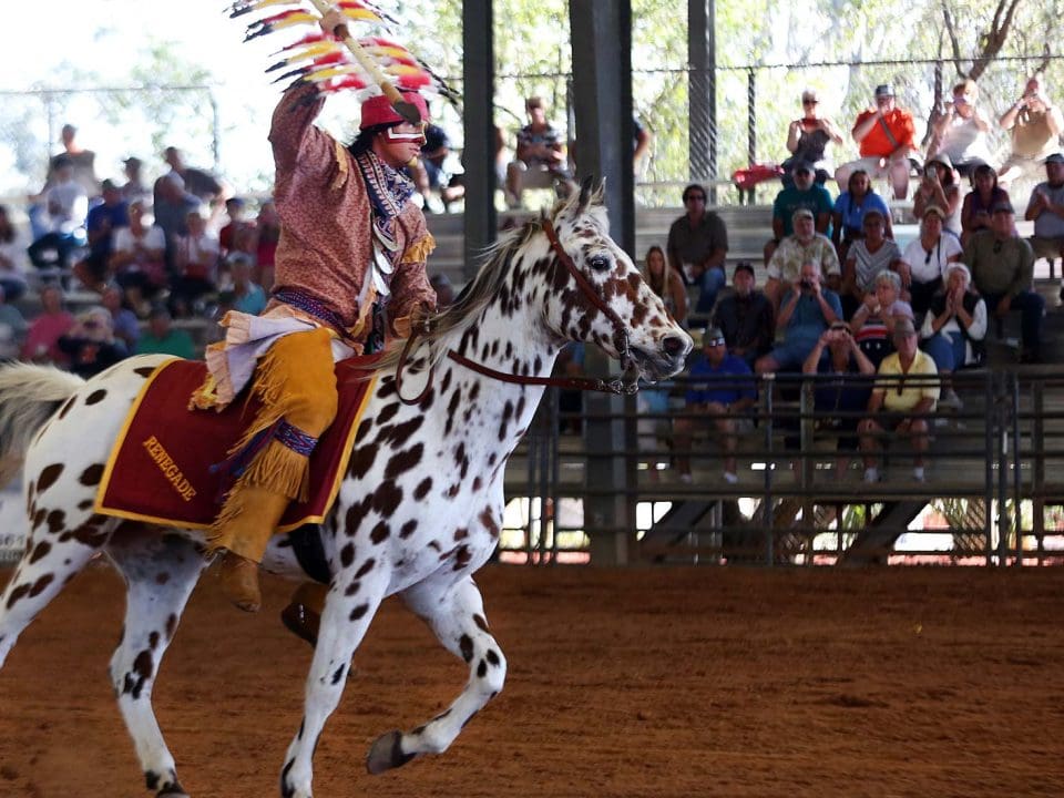 Native American Culture. Indian riding a spotted horse. Photo by Brighton field day.