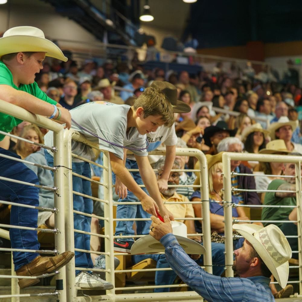 Kids getting autographs at Silver Spurs Rodeo Florida