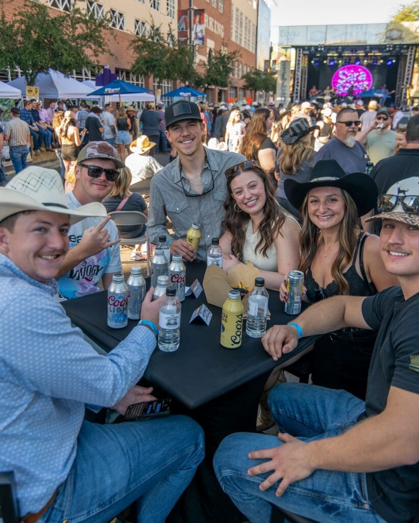 Fans smiling at The Hondo Rodeo Fest