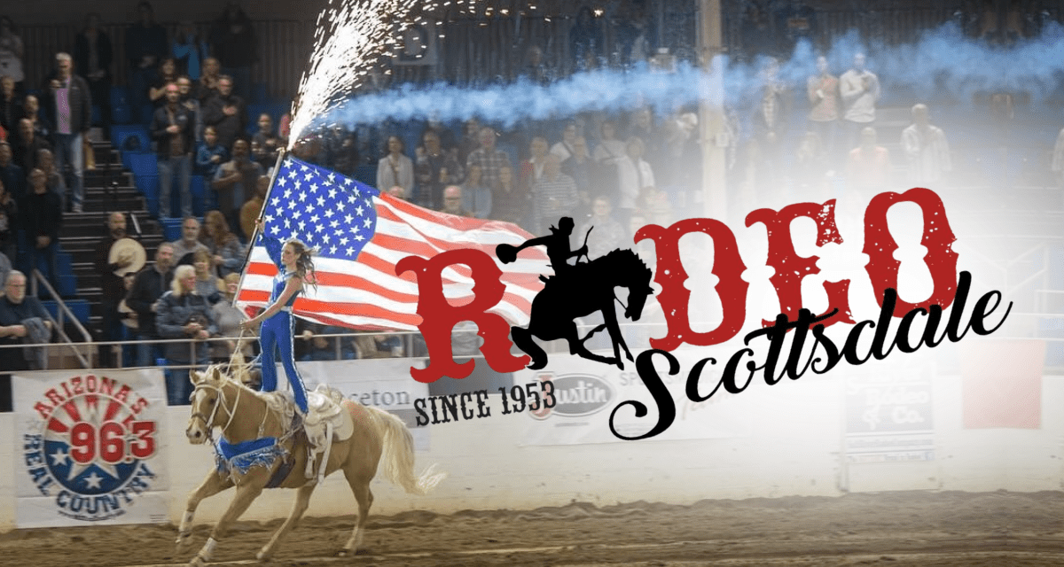 Trick Rider carrying the American Flag in the arena at Rodeo Scottsdale