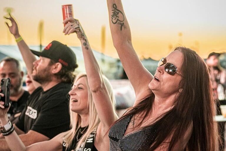 Music fans cheering at Arizona Bike Week