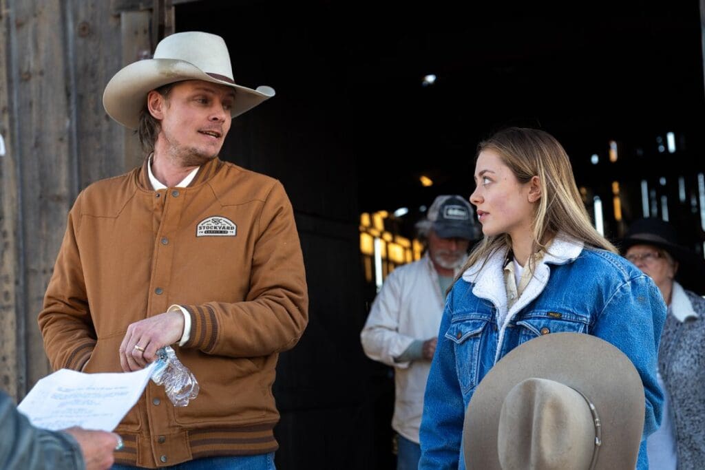 Ned LeDoux and Lily Wright take a break on set