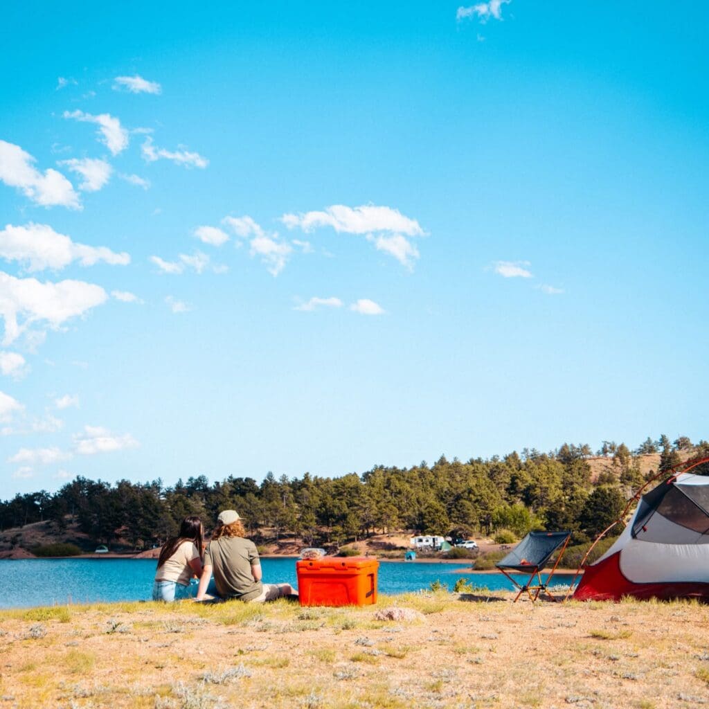 People sitting by a lake in Cheyenne