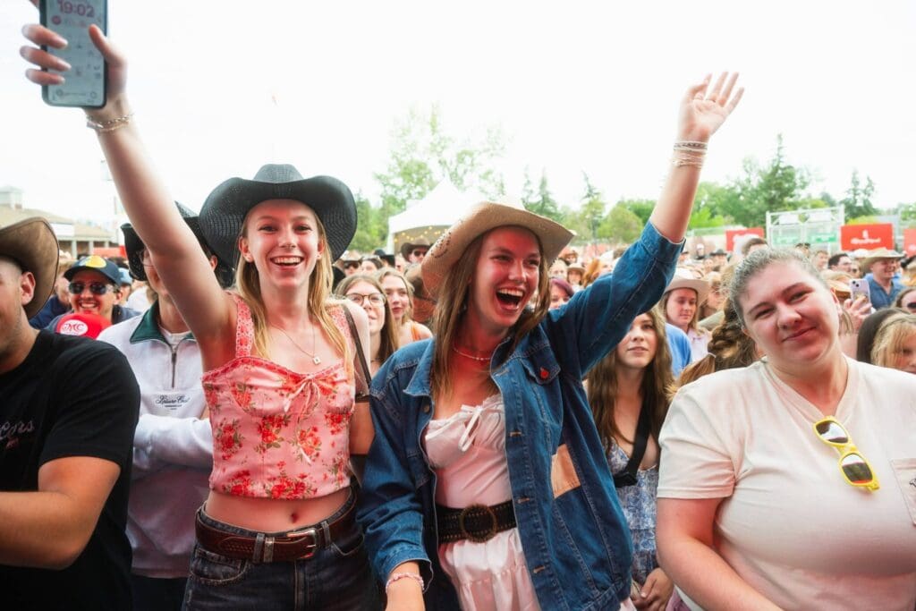 Concert fans cheering at the Calgary Stampede