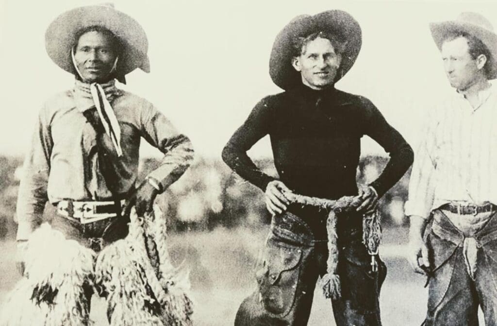 Jackson Sundown after winning the world championship at the Pendleton Round-Up in 1916. Runners up Bob Hall and Rufus Rollins stand L-R