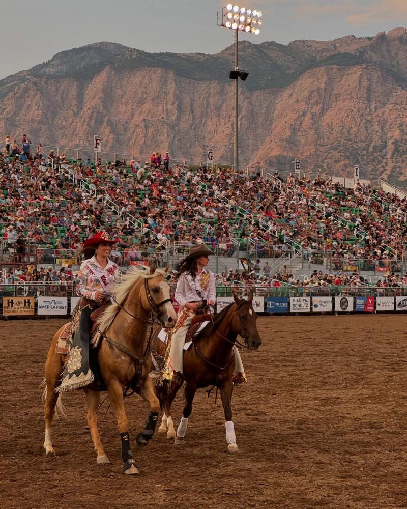 Rodeo queens on horseback riding around the arena in Ogden with beautiful mountains in the back ground. Photos courtesy of Ogden Pioneer