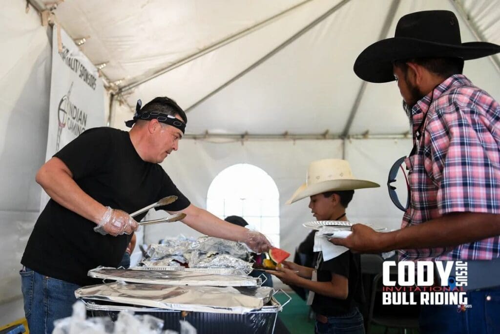 Serving food at Cody Jesus Invitational