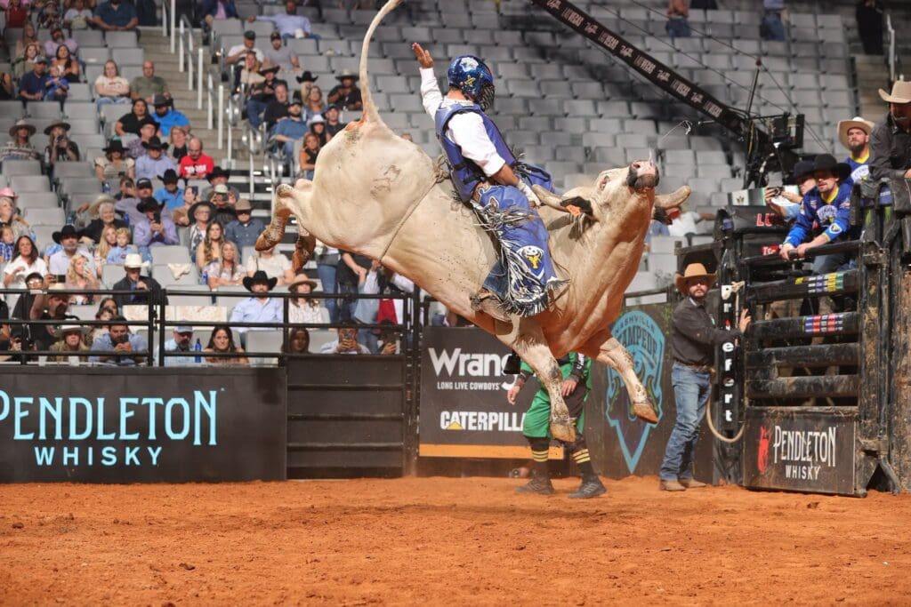 Kaique Pacheco rides Jeb Fredericks/Dakota Rodeo/Chad Bergers Cold Shot for 90 during the first day of the Fort Worth PBR Teams event. Photo by Andy Watson / Bull Stock Media
