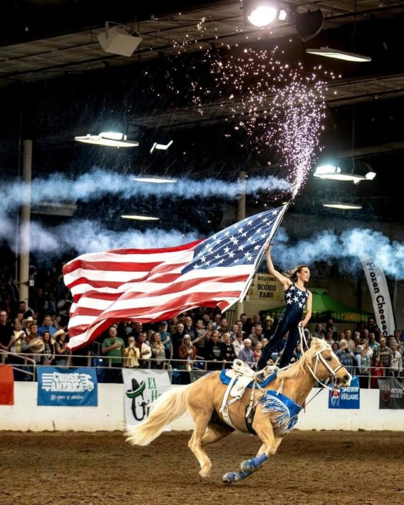Rodeo performer with American Flag