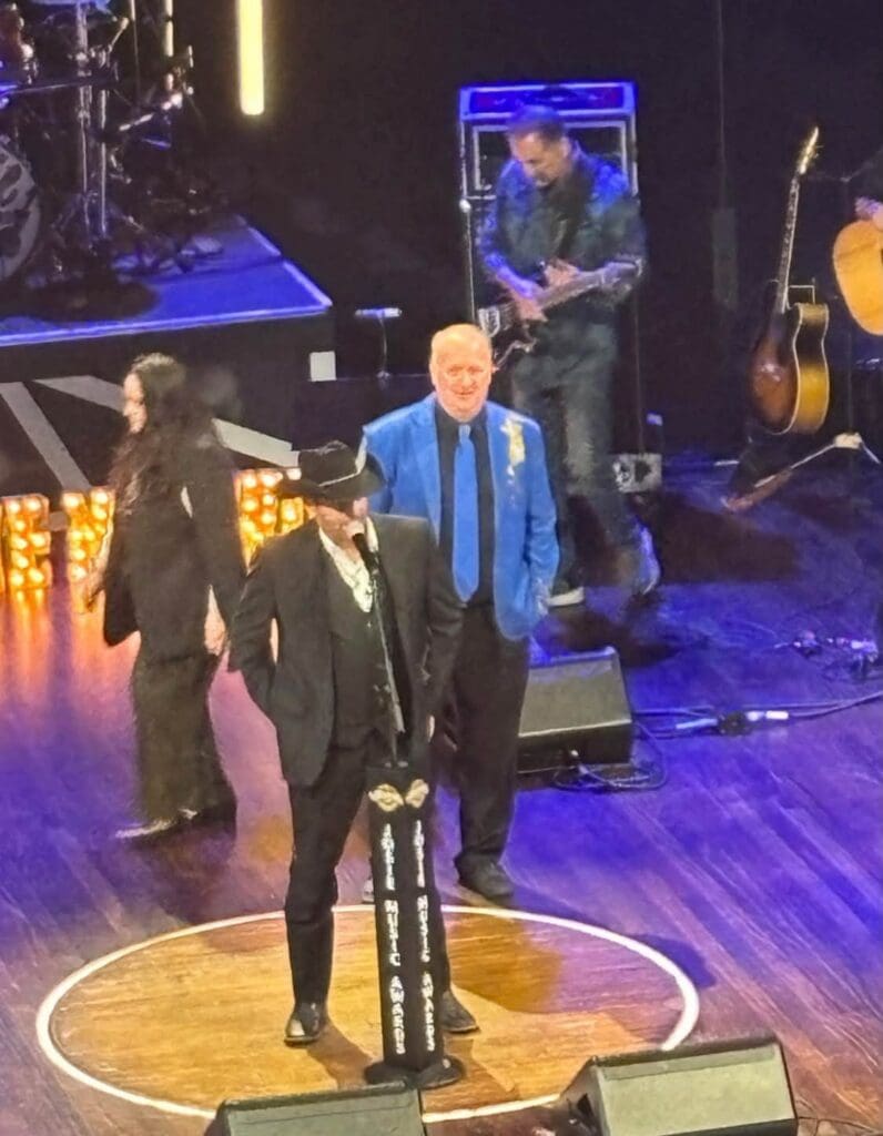 Nathan Dean accepting award in the Opry's Golden Circle